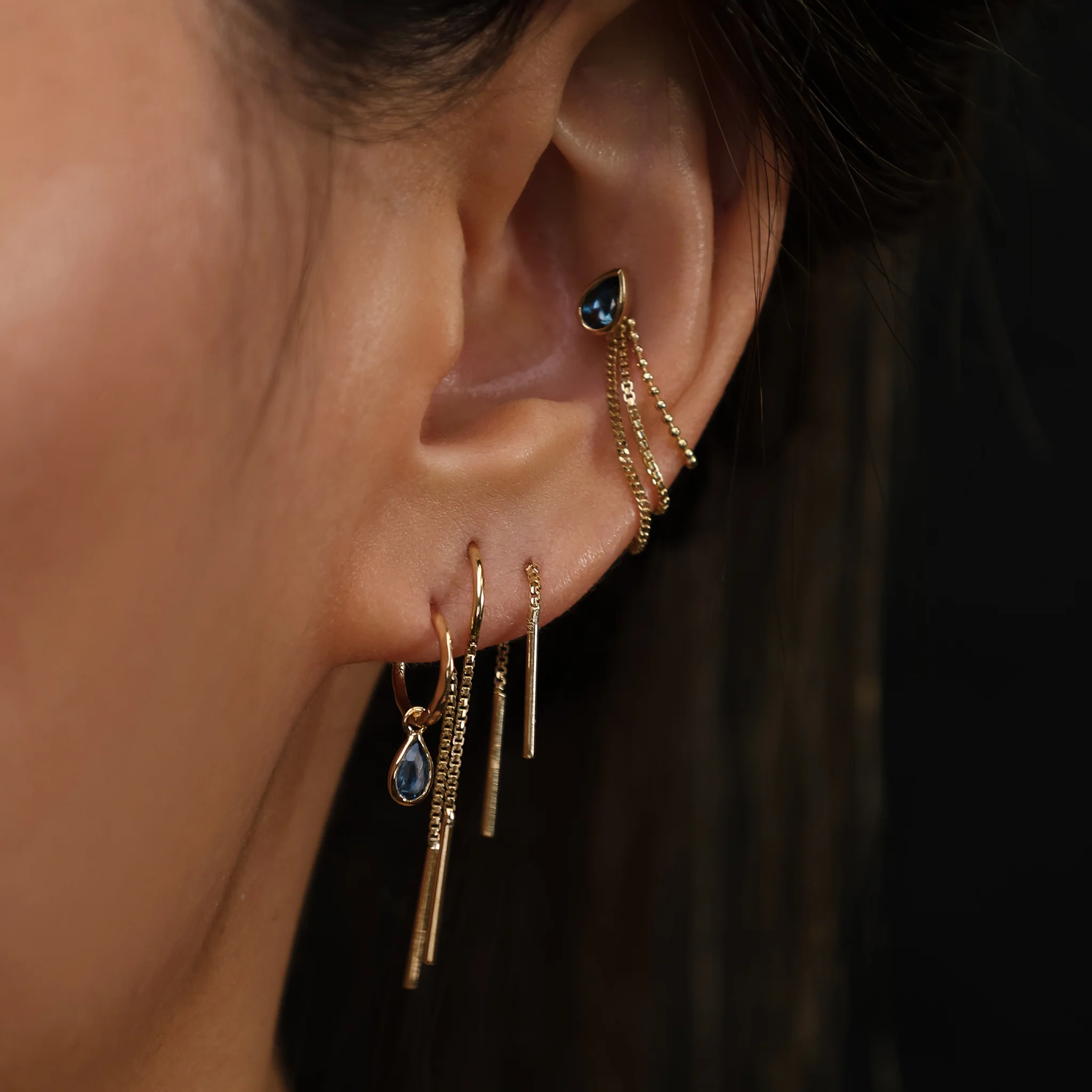 High-quality piercing jewelry for ear, nose, and body piercings, including gold, titanium, flatback studs, barbells, hoops, and clickers available at Elaira Piercing in Lot10 Kuala Lumpur, Malaysia